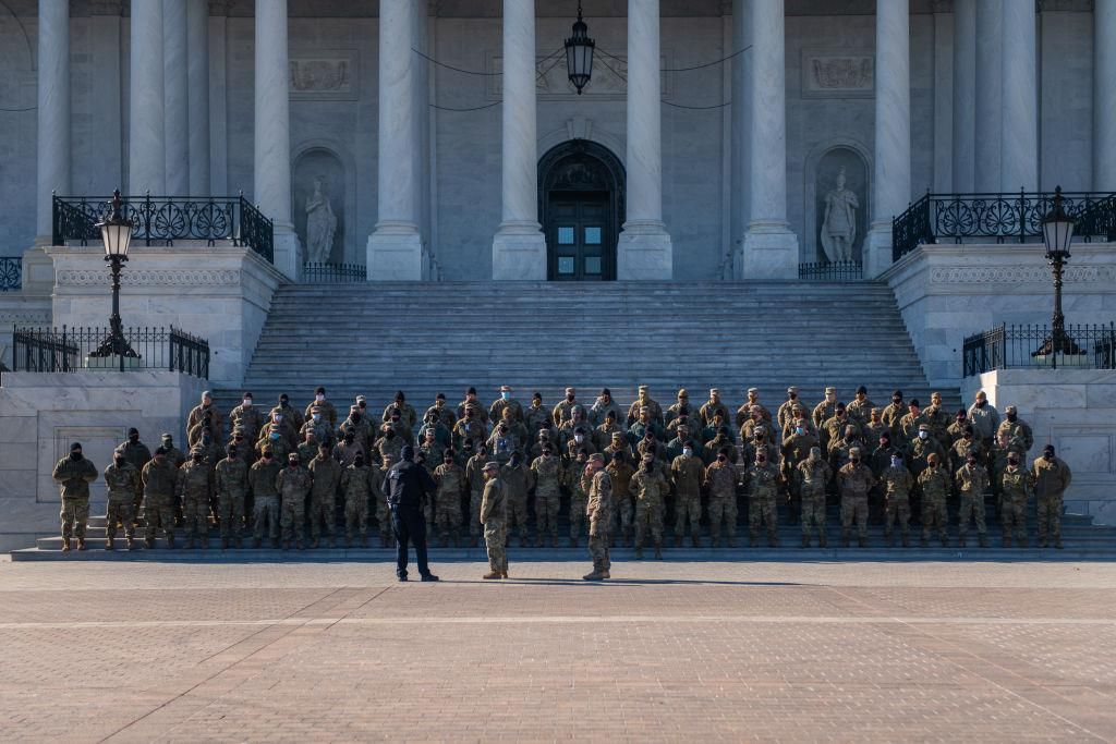 National Guard Citizen-soldiers stand in formation after a U.S. Capitol tour on January 23, 2021 in Washington, DC. Due to COVID-19, Capitol tours had been restricted since March 13, 2020, but have exclusively been reopened for National Guard members. (Photo by Brandon Bell/Getty Images)