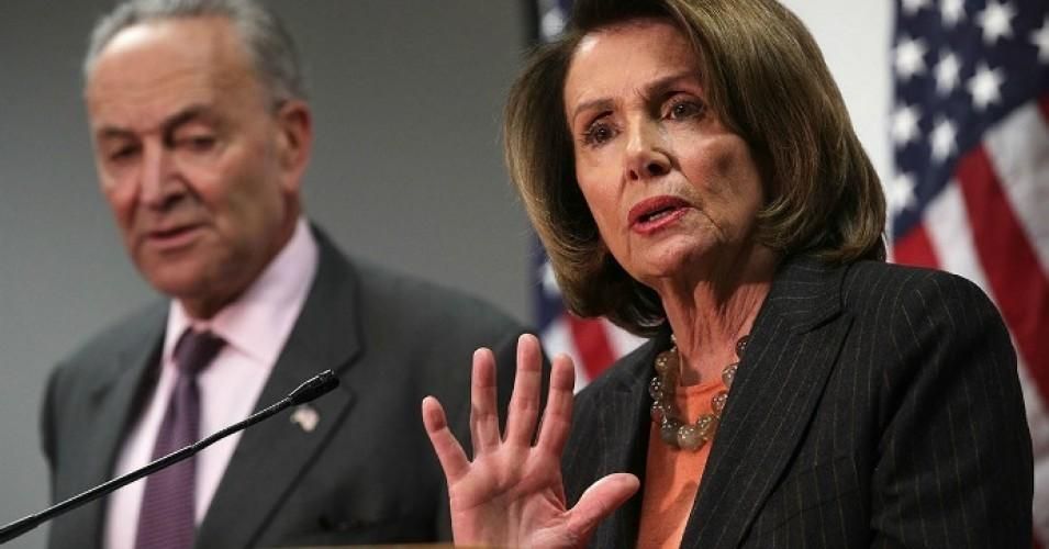 House Minority Leader Nancy Pelosi and Senate Minority Leader Chuck Schumer speak at a press conference in Washington, D.C. (Photo: Alex Wong/Getty Images)
