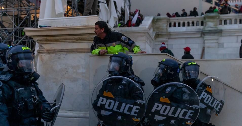 Police seen around Capitol building where pro-Trump supporters riot and breached the Capitol on January 6, 2021. 