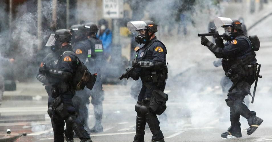 Police use tear gas during protests against the killing of George Floyd in Seattle, Washington on May 30, 2020. (Photo: Jason Redmond/AFP via Getty Images)