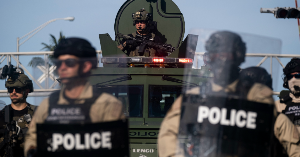 A Miami Police officer watches protestors from an armored vehicle during a rally in Miami, Florida on May 31, 2020 in response to the killing of George Floyd. (Photo: Ricardo Arduengo/AFP via Getty Images)