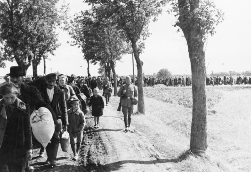 Expulsion from Reichsgau Wartheland. Poles are led to trains under German army escort, as part of the ethnic cleansing of western Poland annexed to the German Reich following the invasion.
