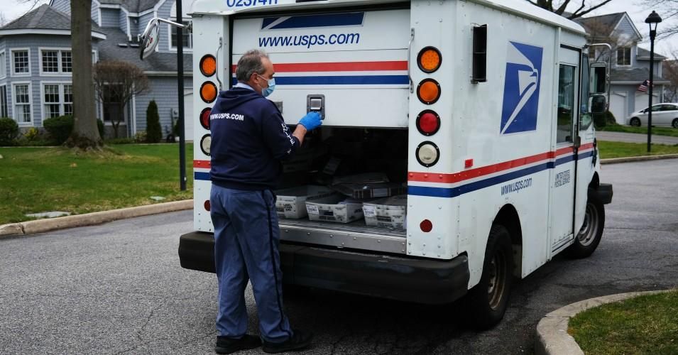 USPS provides service at uniform and reasonable rates, delivering to 157 million addresses at least six days a week, no matter where they live. (Photo: Spencer Platt/Getty Images)