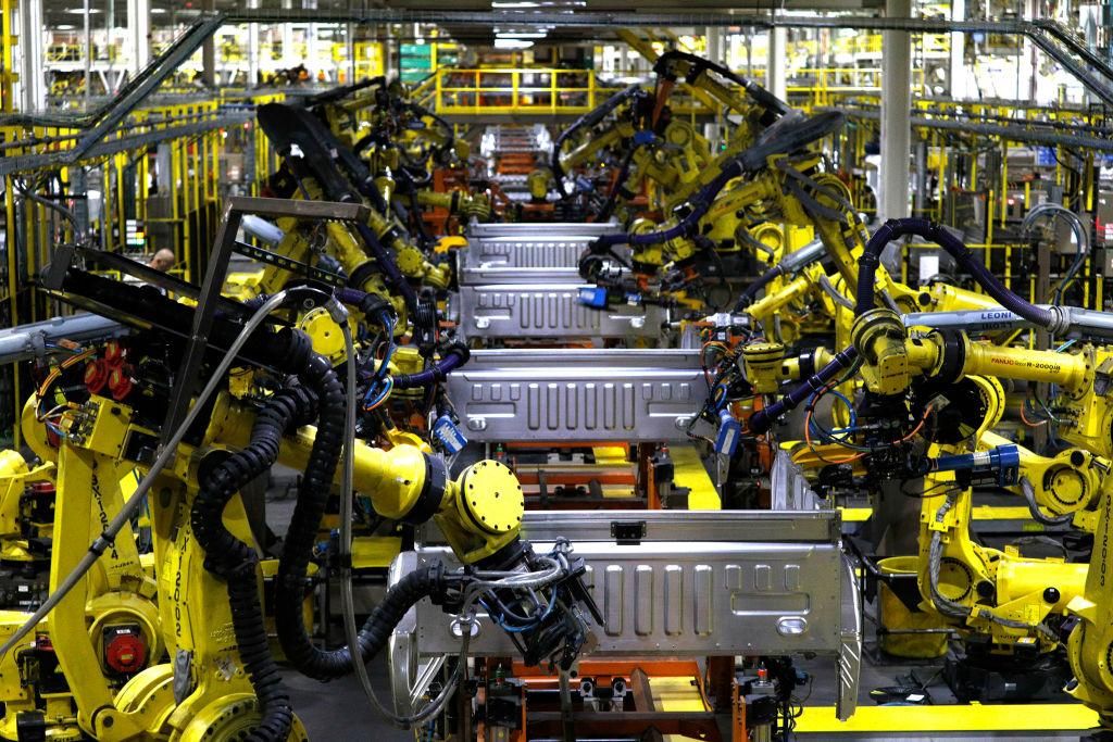 Ford F150 trucks go through robots on the assembly line at the Ford Dearborn Truck Plant on September 27, 2018 in Dearborn, Michigan. (Photo by Bill Pugliano/Getty Images)