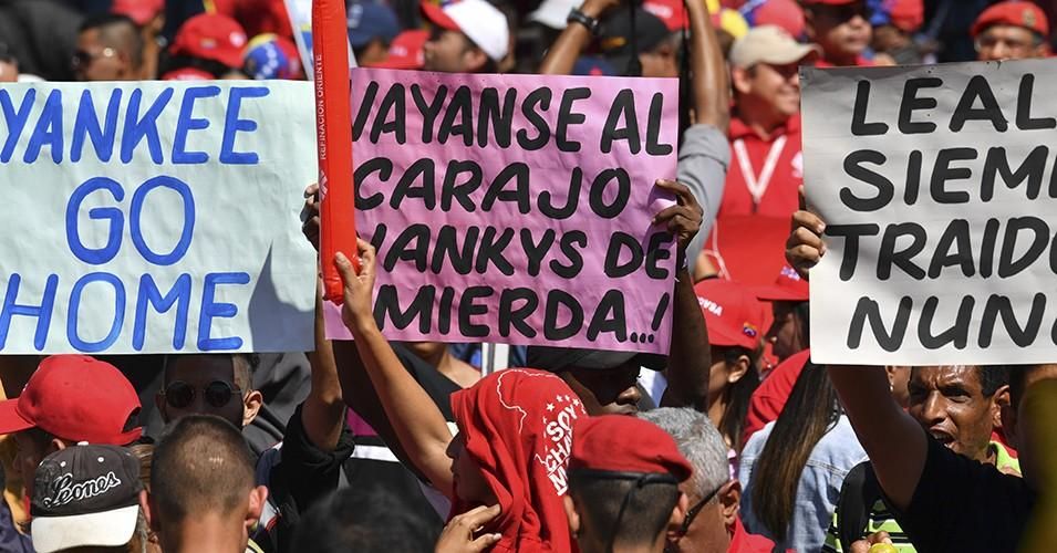 Workers from Venezuela's state oil company, PDVSA, participate in an anti-imperialist march to support Venezuelan President Nicolas Maduro, in front of the Miraflores Presidential Palace in Caracas, Venezuela on January 31, 2019. 