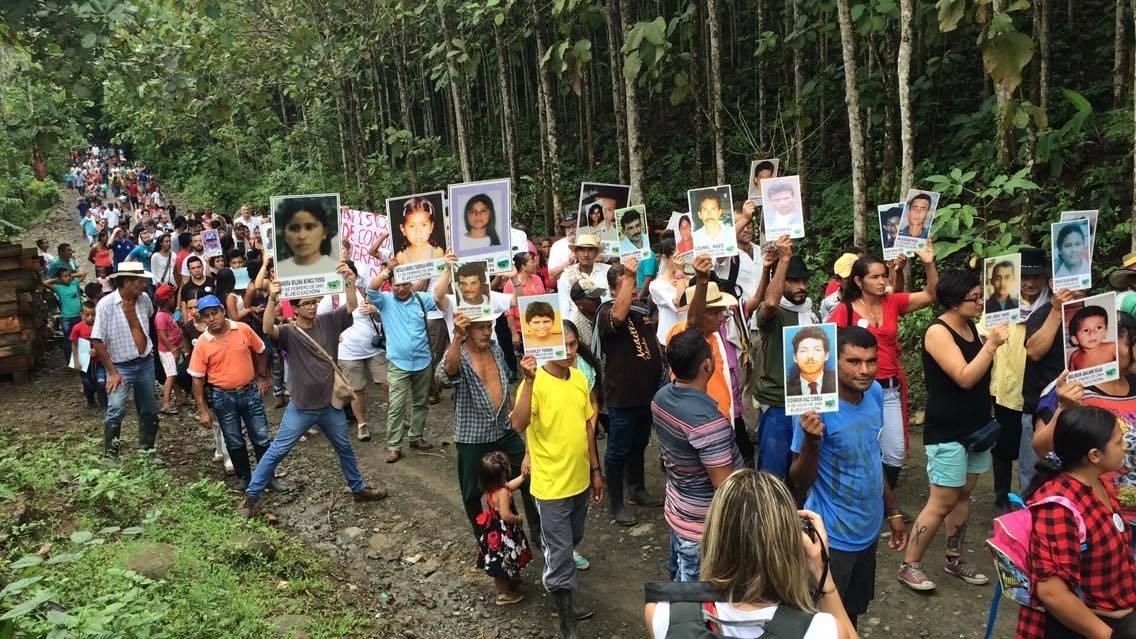 Members of the Comunidad de Paz de San José de Apartadó march in memory of victims of the continuing violence in Colombia. (Photo: Comunidad de Paz de San José de Apartadó)