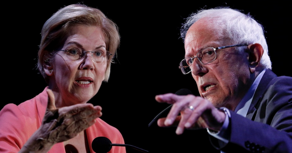 Sens. Elizabeth Warren, left, and Bernie Sanders speak at the NALEO Candidate Forum in Miami, Fla., on June 21, 2019. (Photo: Joe Skipper/Getty Images)