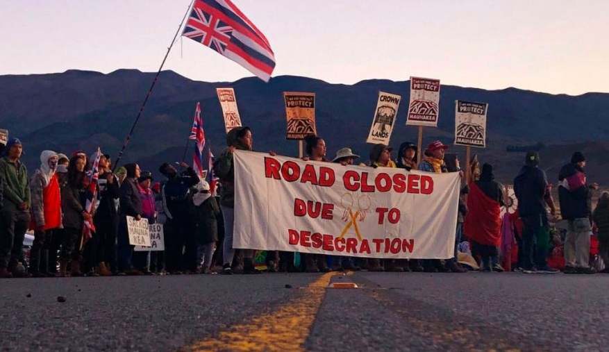 At the heart of the Mauna Kea action is thus a challenge not only to a telescope, but to capital and the pursuit of unmitigated industrial growth at any cost. (Photo: Screenshot/Washington Post)