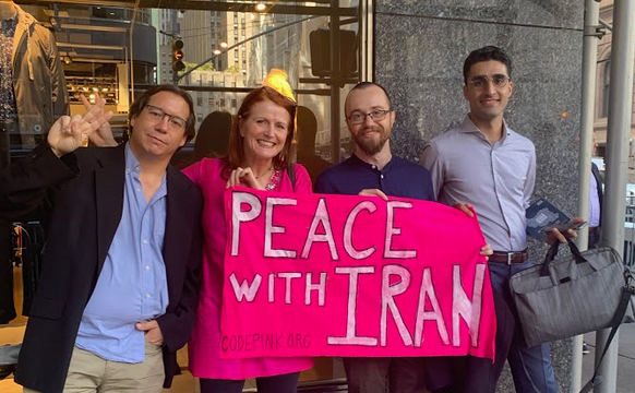 Jodie Evans with others outside of the United Against a Nuclear Iran conference in New York City. (Photo: Codepink)