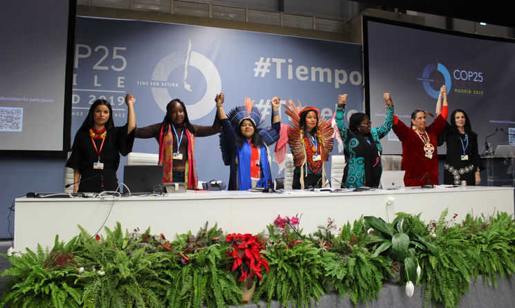 Global frontline women leaders advocate for gender and racial justice, Indigenous rights, and bold climate action during a formal UNFCCC COP25 event in Madrid, 2019. (Photo: Katherine Quaid/WECAN International)