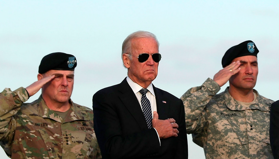 Then Vice President Joseph Biden attending a dignified transfer for Army Pfc. Tyler R. Lubelt of Tamaroa, Illinois, at Dover Air Force Base November 15, 2016 in Dover, Delaware. Lubelt, 20, died November 12 of injuries sustained from a suicide bomb attack at Bagram Airfield near Kabul in Afghanistan. (Photo: Alex Wong/Getty Images)
