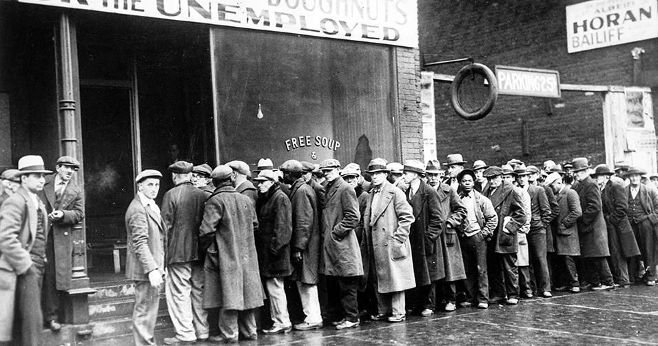 The Great Depression: Unemployed men queued outside a soup kitchen in Chicago.