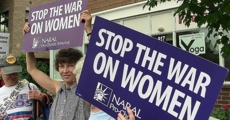 stop the war on women sign