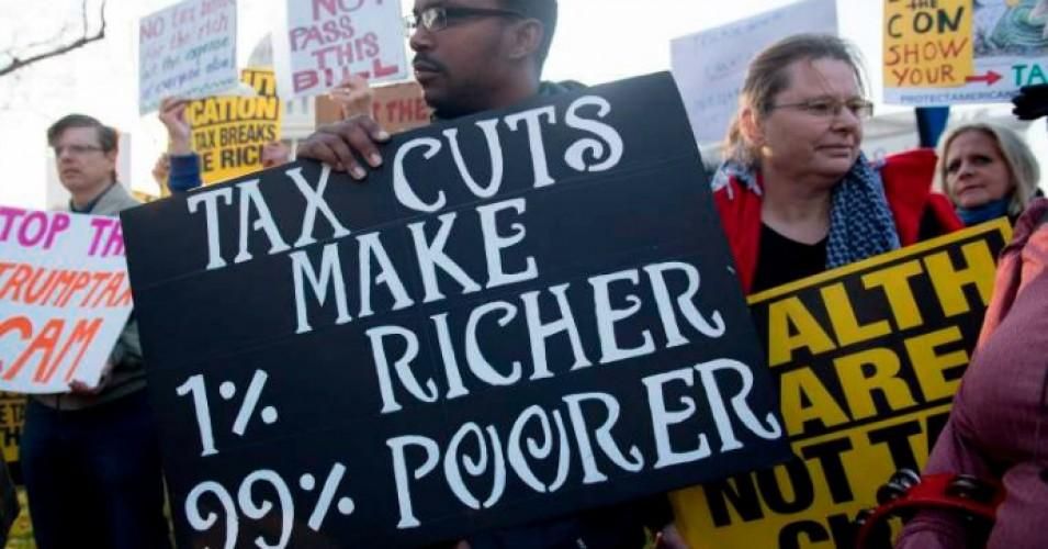 If fully implemented, the 2017 tax cut will result in tax increases for most households in the bottom 80 percent. (Photo: Saul Loeb/AFP/Getty Images)