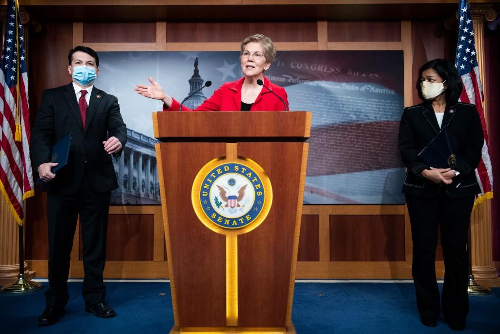 From left, Rep. Brendan Boyle, D-Pa., Sen. Elizabeth Warren, D-Mass., and Rep. Pramila Jayapal, D-Wash., conduct a news conference in the Capitol to introduce the Ultra-Millionaire Tax Act which would tax high net worth households on Monday, March 1, 2021. (Photo By Tom Williams/CQ-Roll Call, Inc via Getty Images)