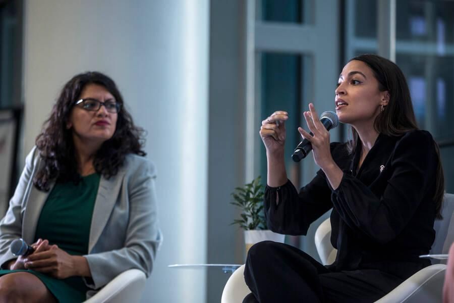 Rep. Alexandria Ocasio-Cortez (D-NY) speaks during a town hall hosted by the NAACP on September 11, 2019 in Washington, DC. Also pictured is Rep. Rashida Tlaib (D-MI). (Photo by Zach Gibson/Getty Images)