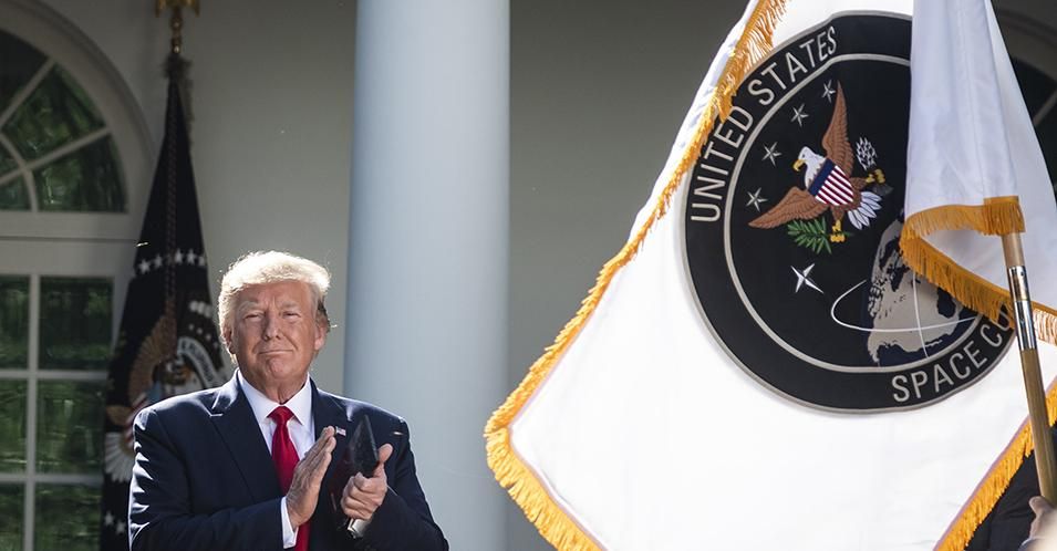 President Donald J. Trump looks as a flag is revealed during a ceremony to establish the U.S. Space Command in the Rose Garden in the Rose Garden at the White House on Thursday, Aug 29, 2019 in Washington, DC. 
