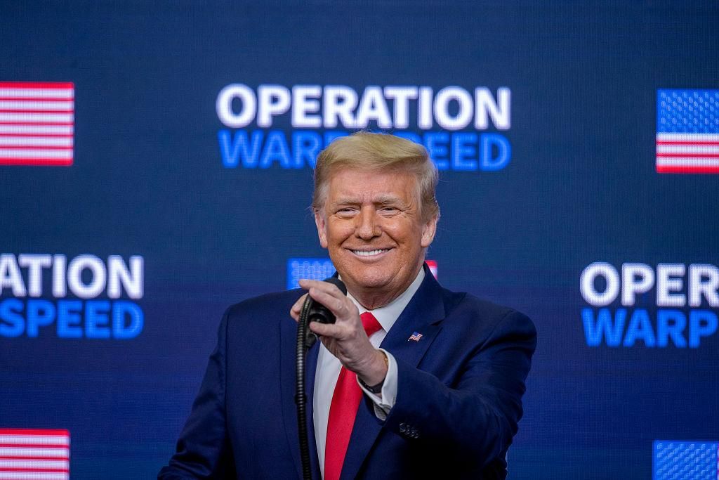 US President Donald Trump speaks at the Operation Warp Speed Vaccine Summit on December 08, 2020 in Washington, DC. The president signed an executive order stating the US would provide vaccines to Americans before aiding other nations. (Photo by Tasos Katopodis/Getty Images)