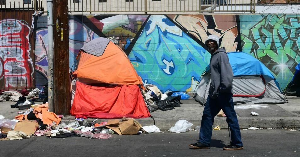 The homeless, society’s all but invisible castaways, can hope for little at a time when they will need more help than ever. (Photo: Frederic J. Brown/AFP/Getty Images)