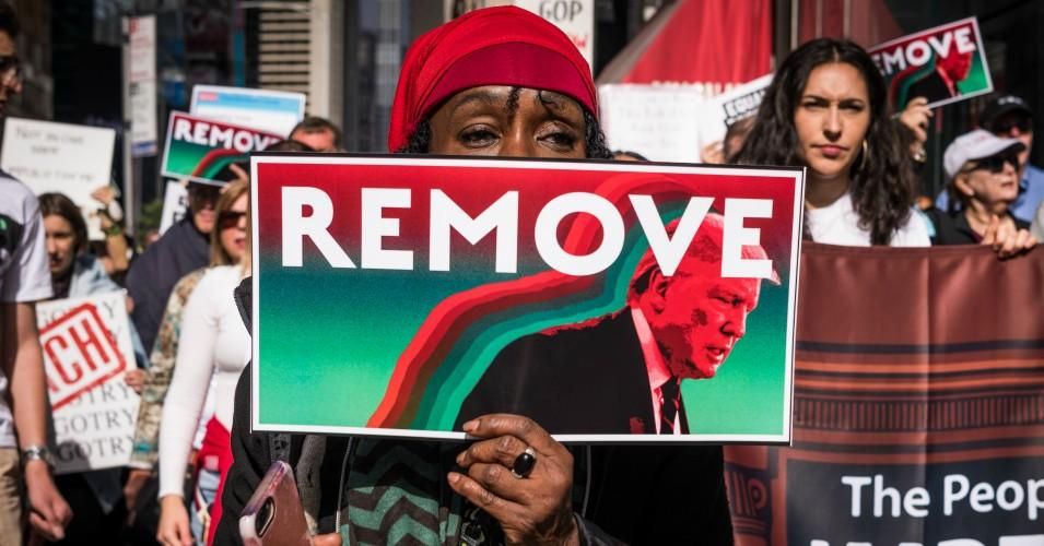 Hundreds of activists attend a rally in New York City on October 13, 2019 demanding that Congress fulfill its constitutional duty and impeach President Donald Trump. "Broadening the impeachment makes constitutional sense," writes Isaac, "and it makes political sense, too." (Photo: Gabriele Holtermann-Gorden/Pacific Press/LightRocket via Getty Images)