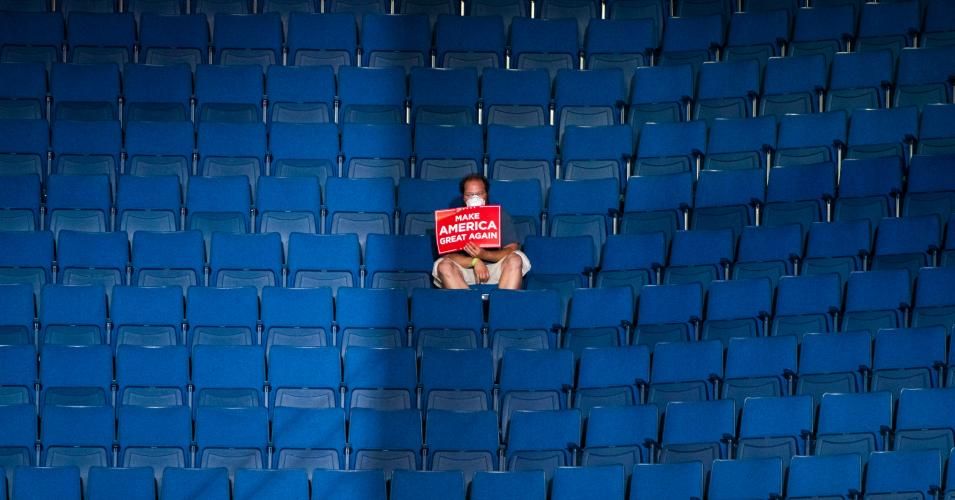 A supporter sits alone in the top sections of seating as Vice President Mike Pence speaks before President Donald J. Trump arrives for a "Make America Great Again!" rally at the BOK Center on Saturday, June 20, 2020 in Tulsa, OK. (Photo: Jabin Botsford/The Washington Post via Getty Images)