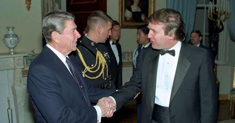 Former President Donald Trump is greeted by his ideological precursor President Ronald Reagan at a 1987 White House reception. (Photo: Ronald Reagan Presidential Library, cc)