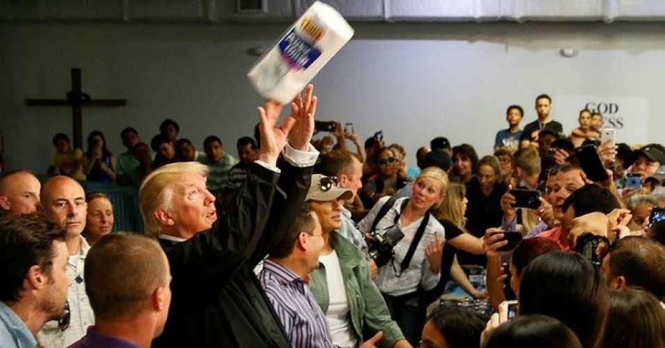 President Donald Trump throwing paper towels to hurricane victims during a visit to Puerto Rico.