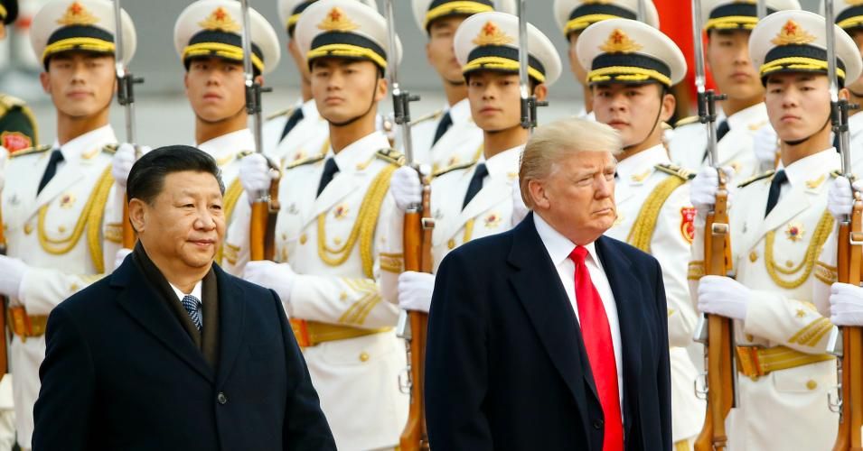 U.S. President Donald Trump takes part in a welcoming ceremony with China's President Xi Jinping on November 9, 2017 in Beijing, China. Trump is on a 10-day trip to Asia. (Photo: Thomas Peter-Pool/Getty Images)