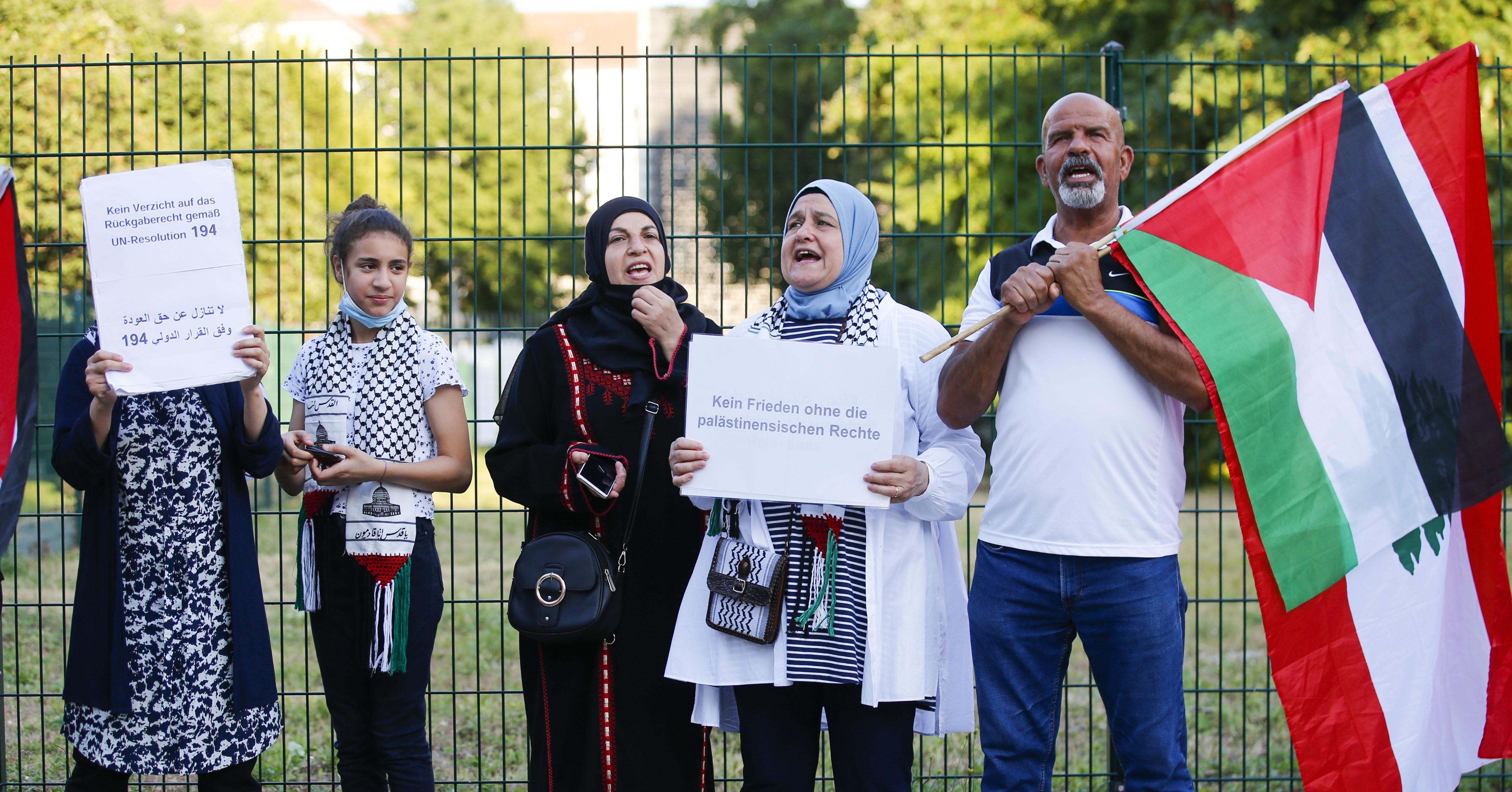 A group of Palestinians gathers in front of the UAE's Embassy in Berlin to protest against the UAE-Israel normalization deal, on August 17, 2020, in Berlin, Germany. (Photo by Abdulhamid Hosbas/Anadolu Agency via Getty Images)