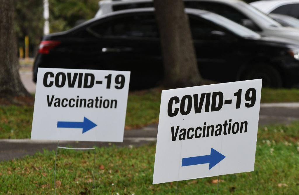 Signs posted at a FEMA COVID-19 vaccination site at the Northwest Community Center in Florida. (Photo: Paul Hennessy/SOPA Images/LightRocket via Getty Images)