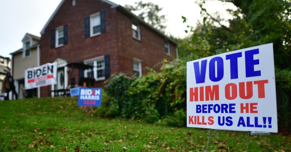 A front yard placard states "VOTE HIM OUT BEFORE HE KILLS US ALL!!" and multiple campaign signs in support of Democratic presidential nominee Joe Biden on the penultimate day before the general election on November 1, 2020 in Philadelphia, Pennsylvania. The grassroots get of the vote campaign efforts of canvassing, door knocking, literature drops, phone calling, and texting, will prove crucial in determening the outcome of voter turnout and ultimately the presidency. (Photo: Mark Makela/Getty Images)
