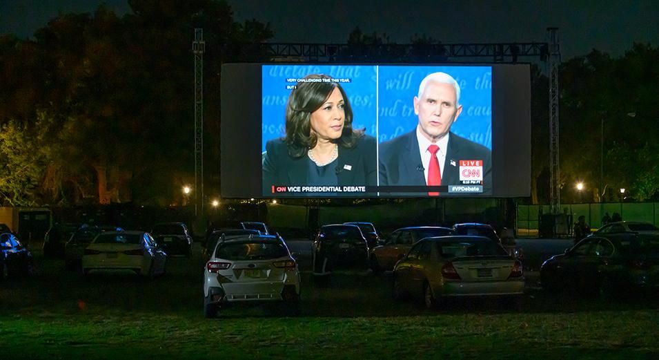 People attend a drive-in watch party for the 2020 United States Vice Presidential debate in Queens Drive-In at The New York Hall of Science on October 07, 2020 in New York City