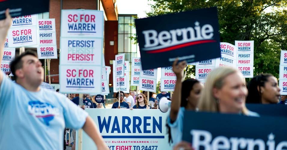 Supporters of Senator Elizabeth Warren and Senator Bernie Sanders supporters cheer and chat outside the James Clyburns World Famous Fish Fry in Columbia, South Carolina June 21, 2019. (Photo: Melina Mara/The Washington Post via Getty Images)