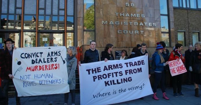 Demonstrators denounce the arms trade's profits from killing