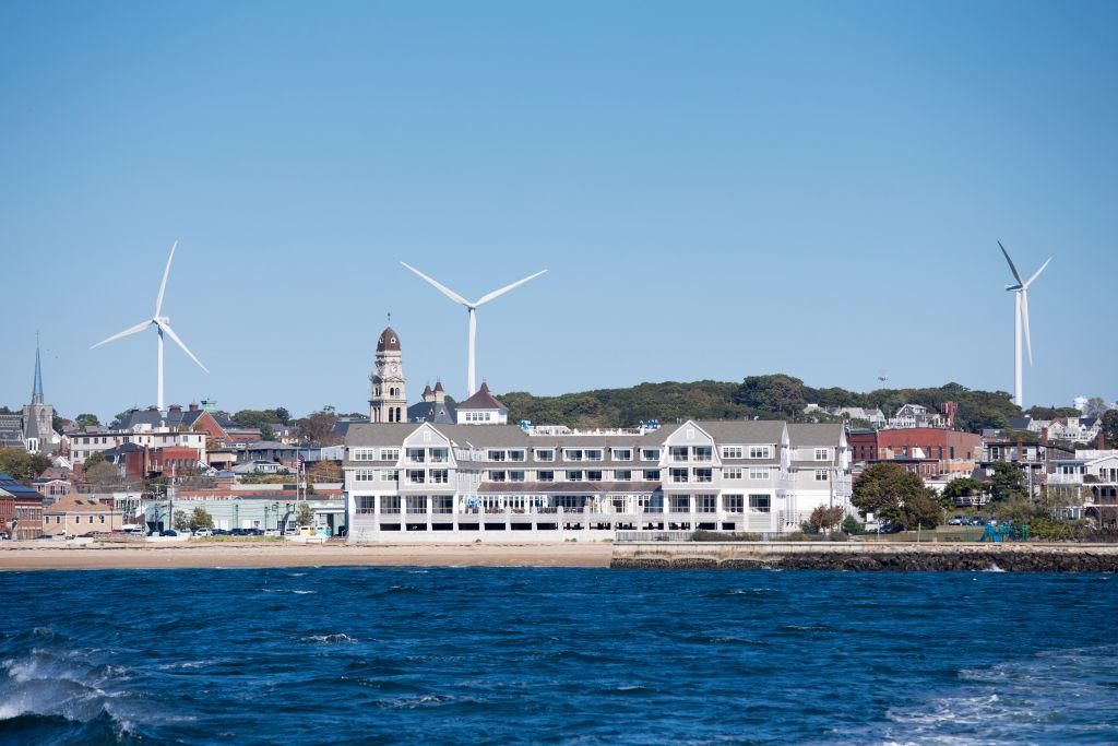 Beauport Hotel with wind turbines behind in Gloucester, Massachusetts, New England, USA. (Photo by Tim Graham/Getty Images)