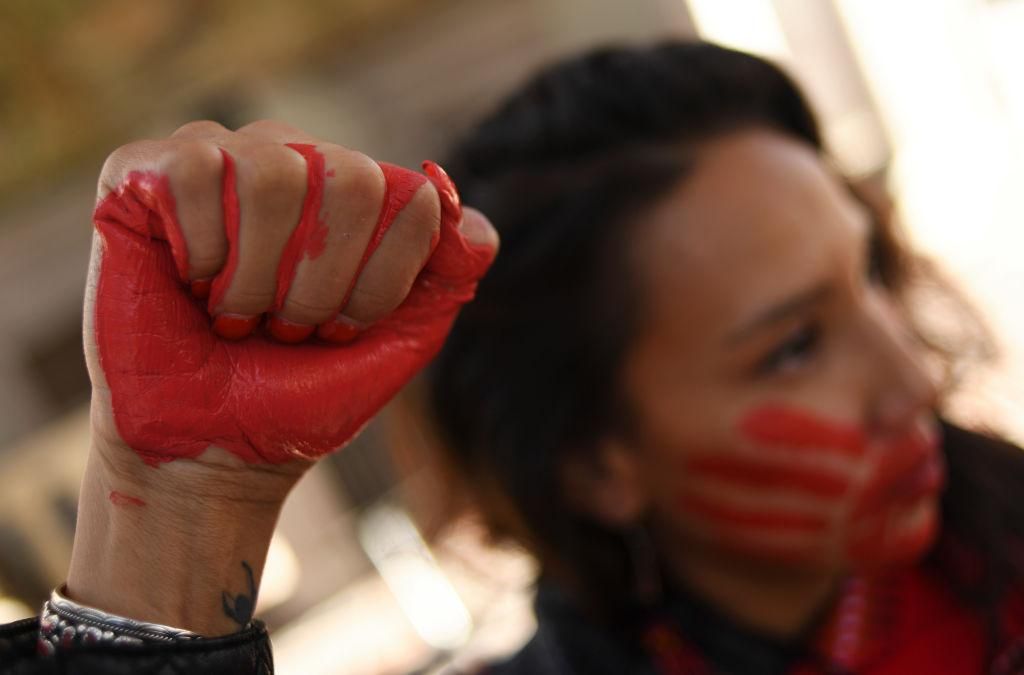 Micaela Iron Shell has painted red hands over their mouth to show solidarity for missing and murdered indigenous, black and migrant women and children during a rally with Climate activist Greta Thunberg at Civic Center Park on October 11, 2019 in Denver, Colorado. (Photo: RJ Sangosti/MediaNews Group/The Denver Post via Getty Images)
