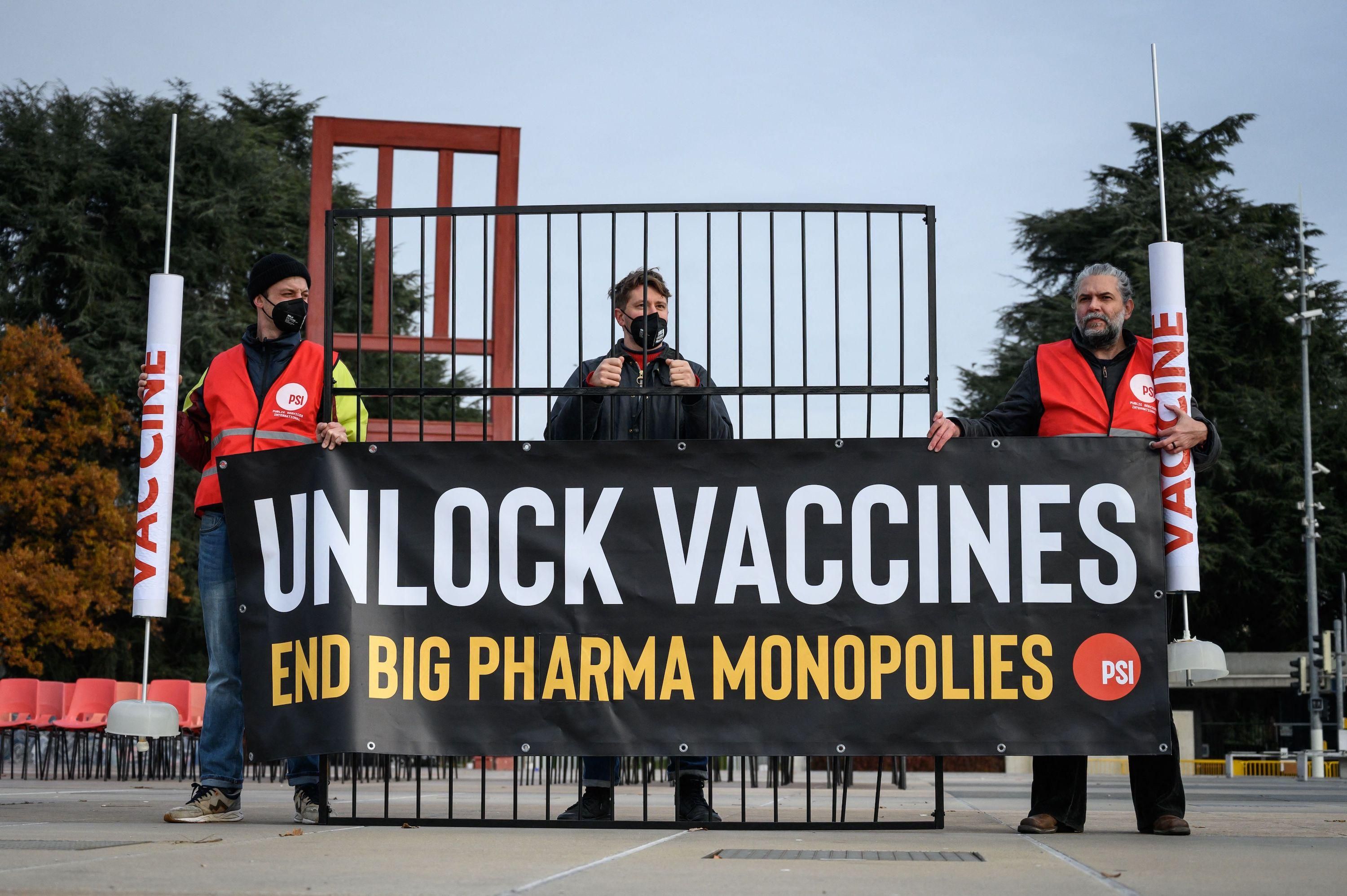 Activists protest in favor of an agreement to waive patent protections for Covid-19 vaccines on November 30, 2021 in Geneva.