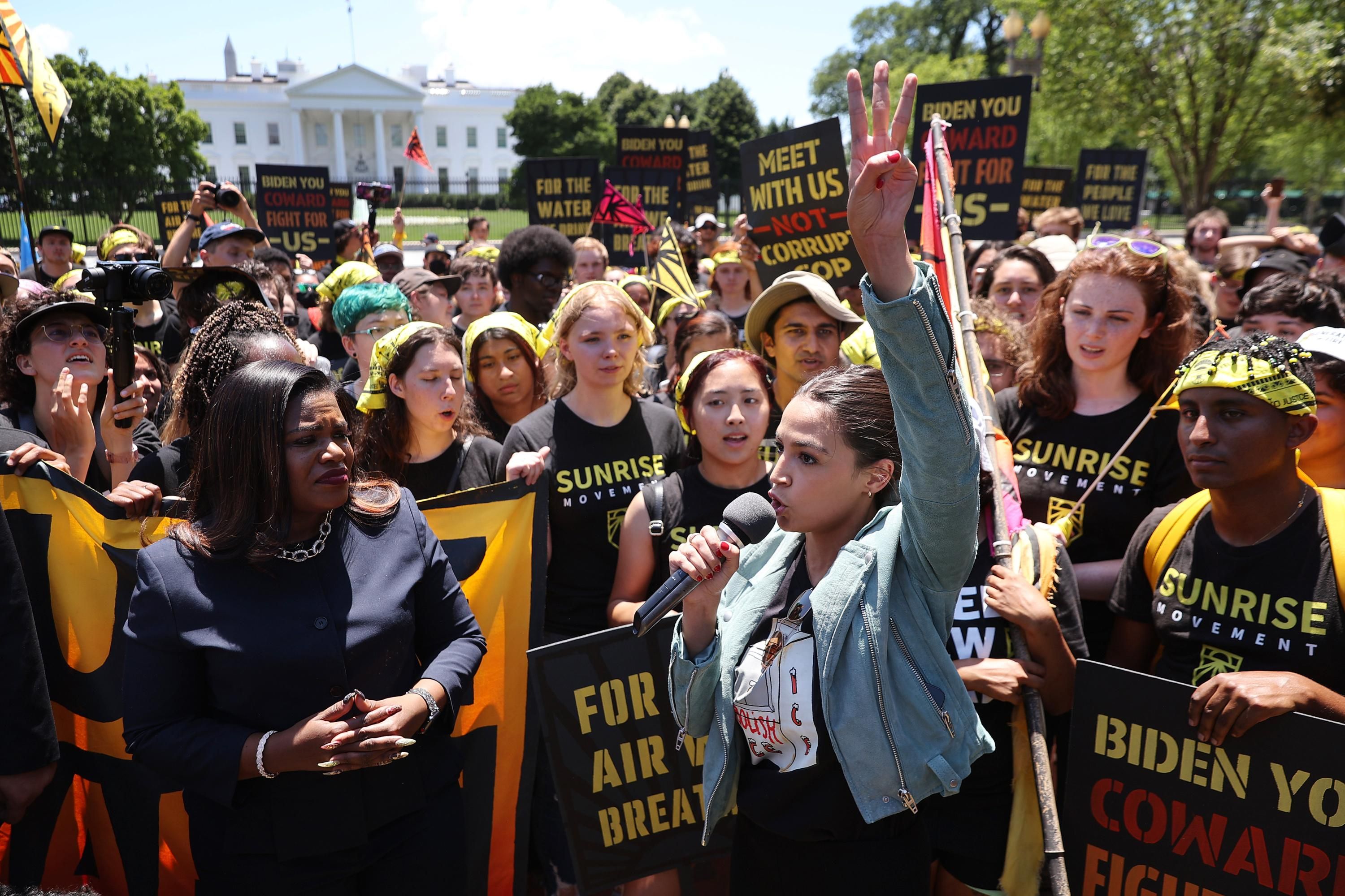 Rep. Alexandria Ocasio-Cortez speaks at a Sunrise Movement rally.