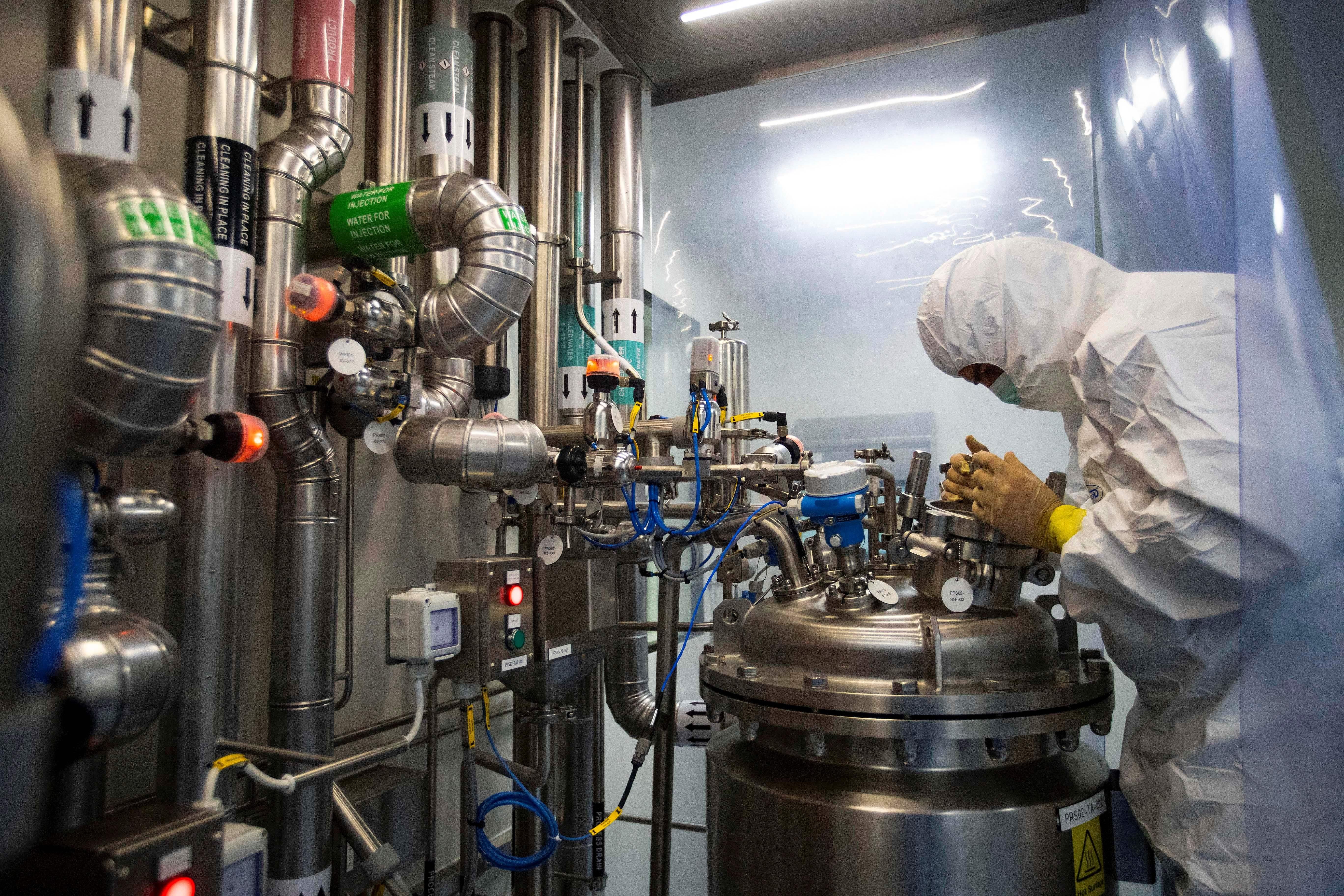 A worker finalizes details to start the production at the recently inaugurated CIGB Industrial Biotechnological Complex in Mariel, Cuba, on November 5, 2021. 