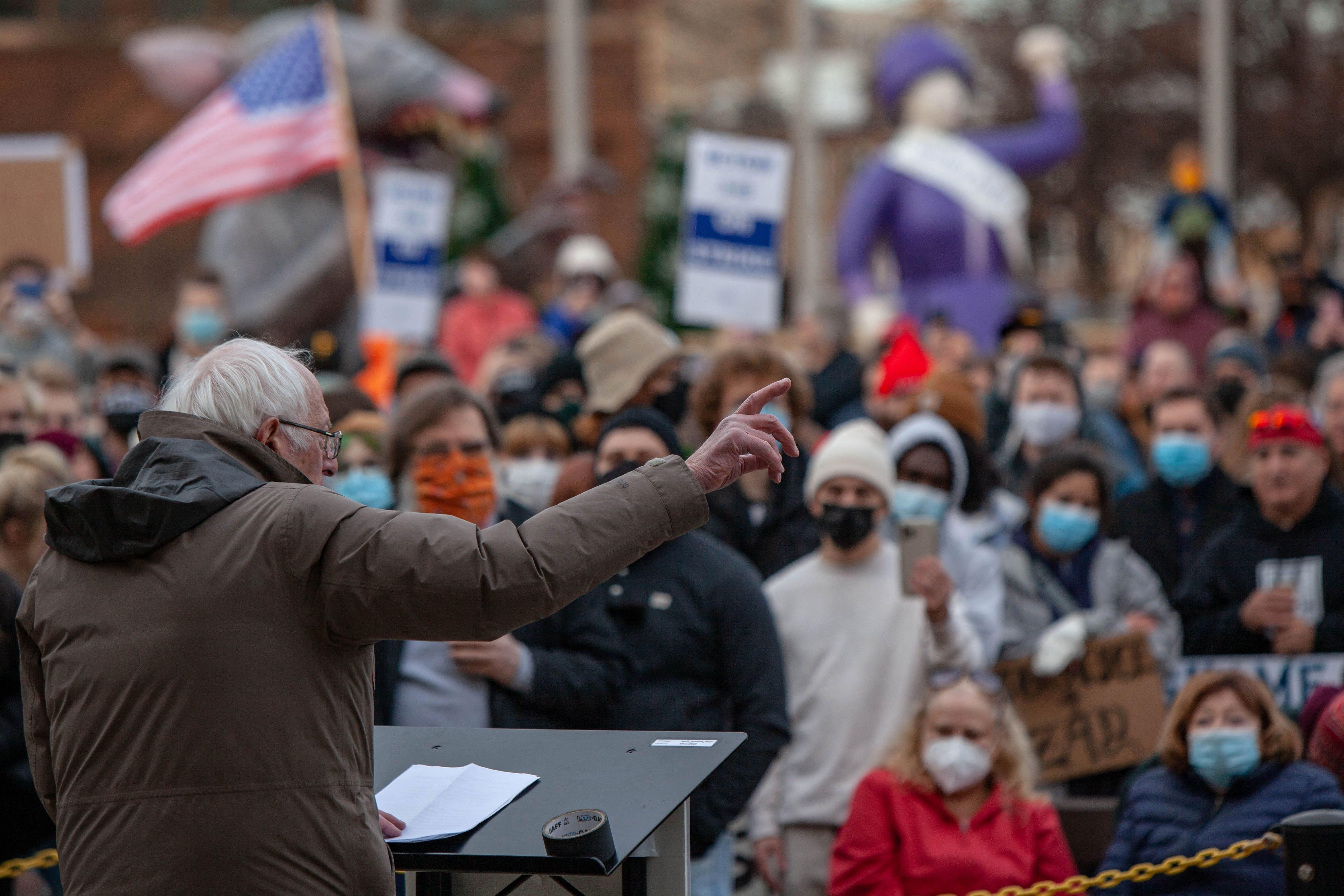 U.S. Sen. Bernie Sanders (I-Vt.) gestures as he speaks to striking Kellogg's workers in downtown Battle Creek, Michigan on December 17, 2021.