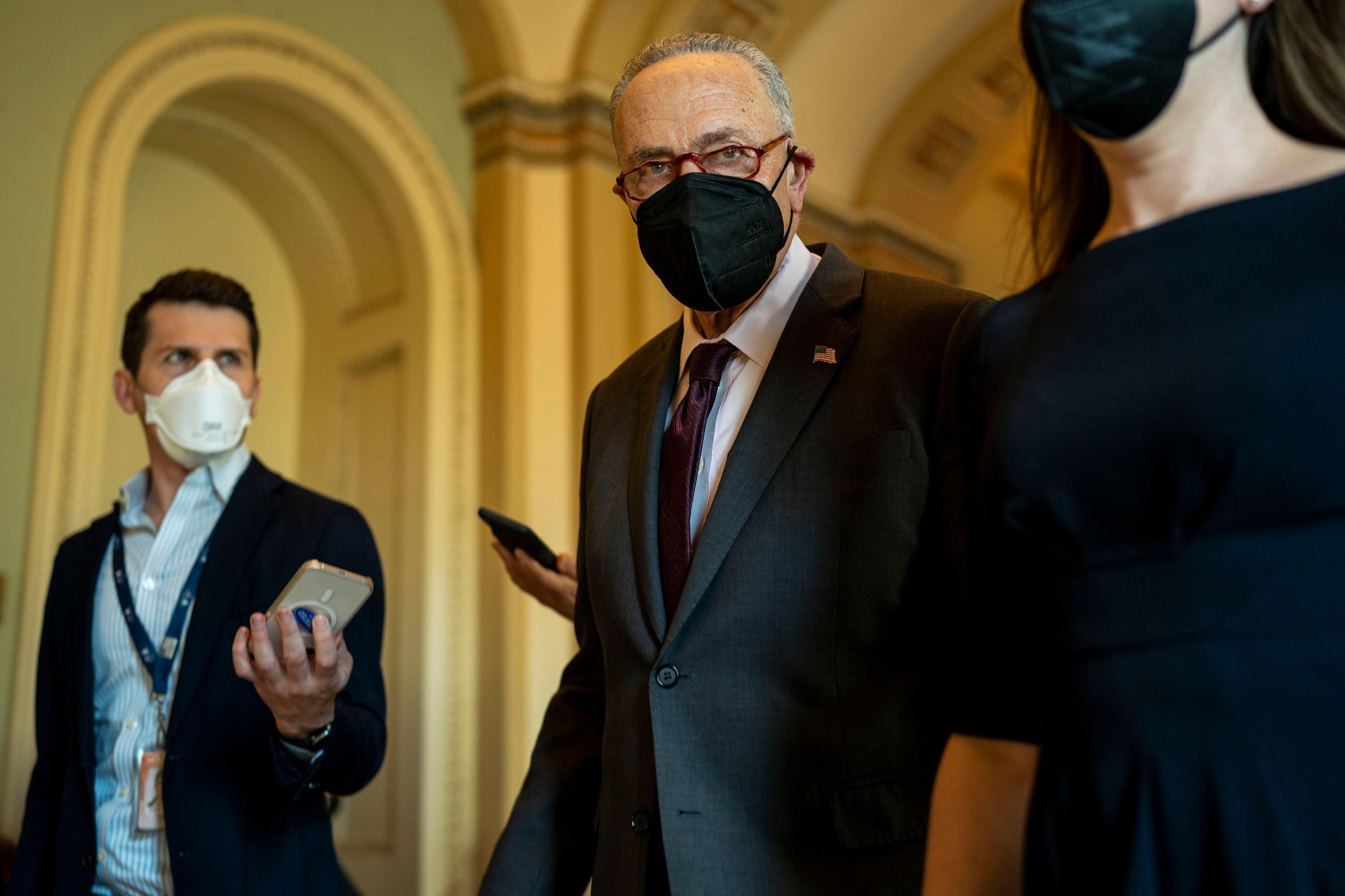 Senate Majority Leader Chuck Schumer walks in the U.S. Capitol Building