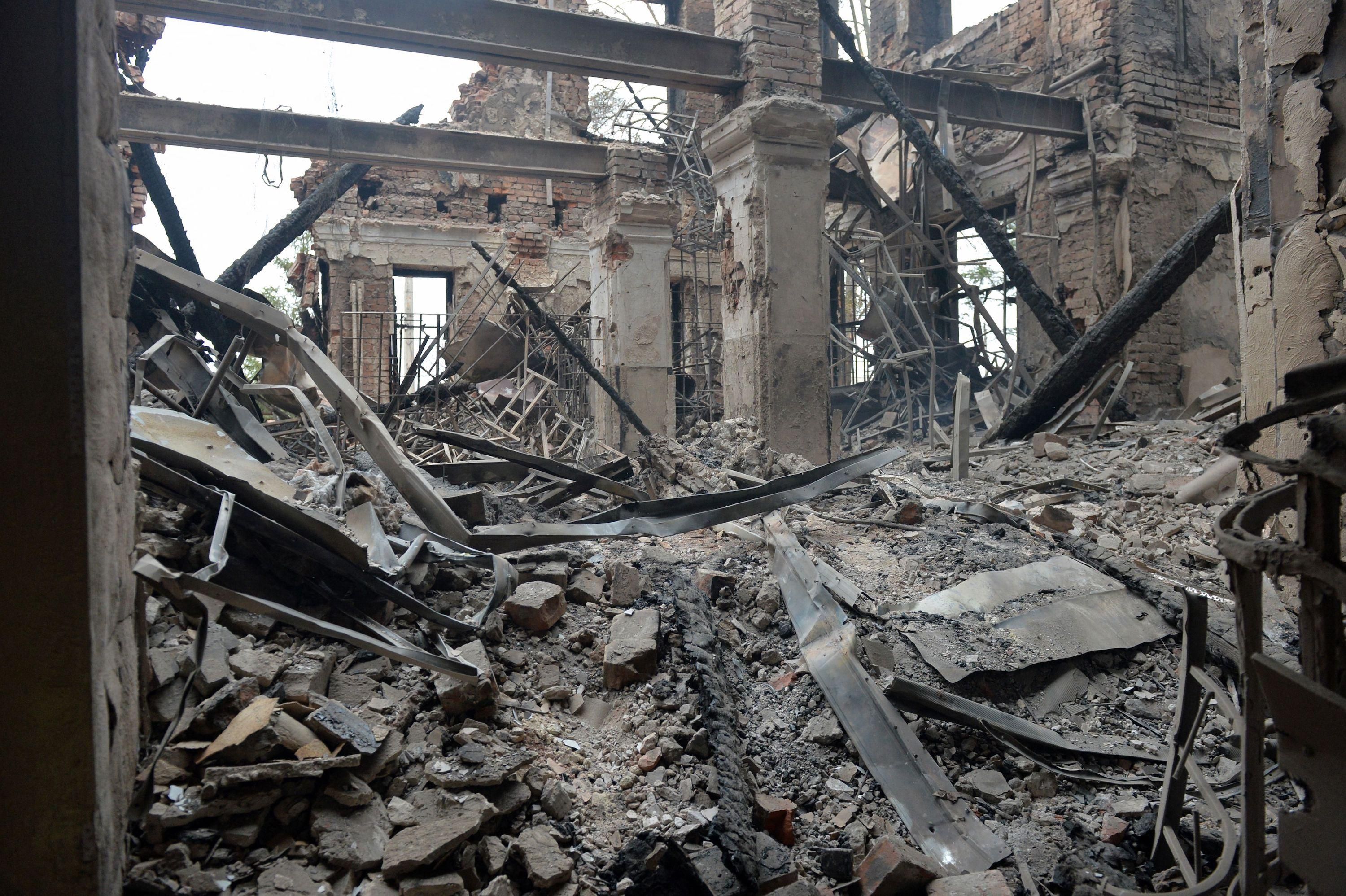 This photograph shows a view of a school destroyed as a result of fighting not far from the center of the Ukrainian city of Kharkiv