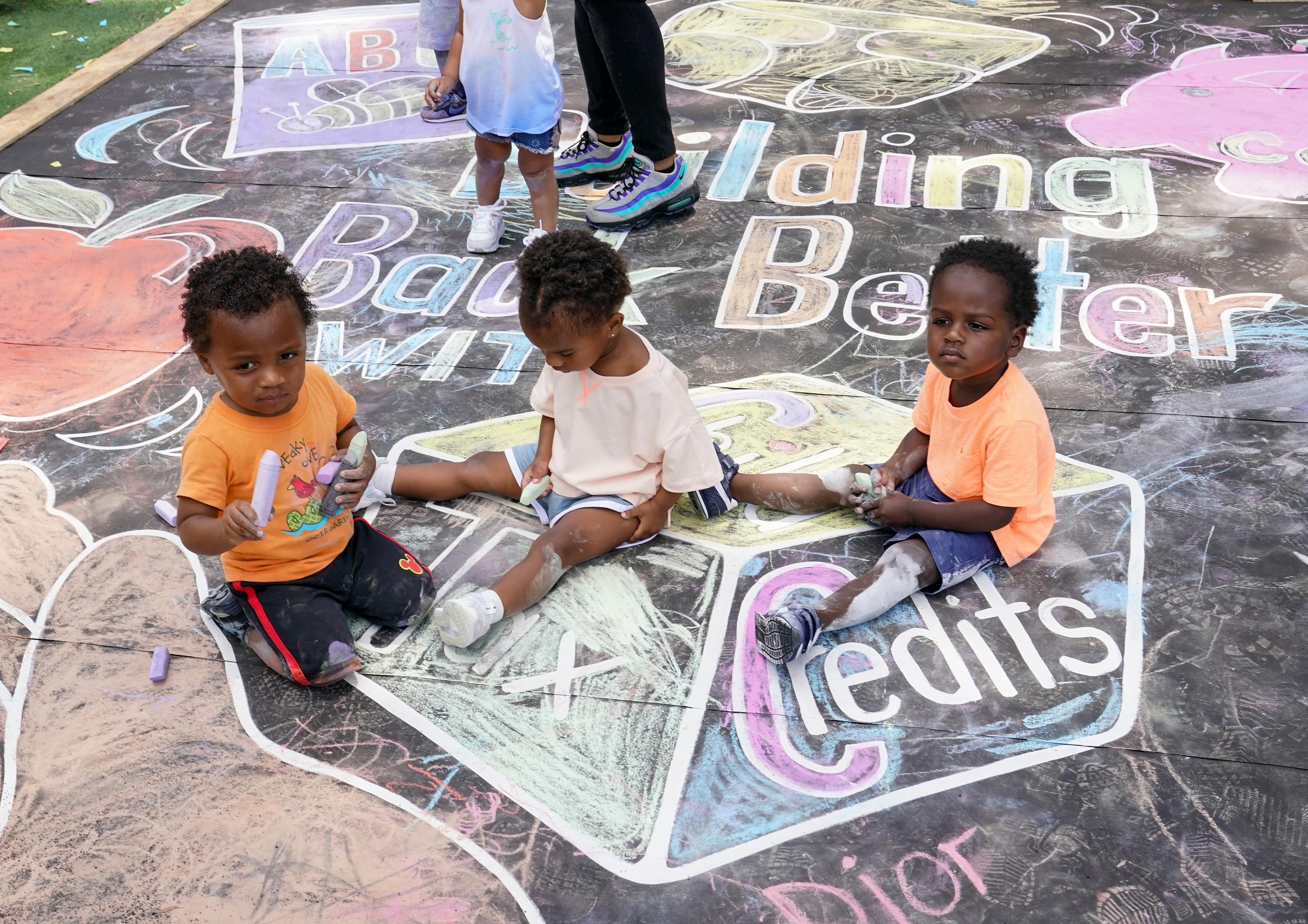 Kids draw at a playground in Washington, D.C.