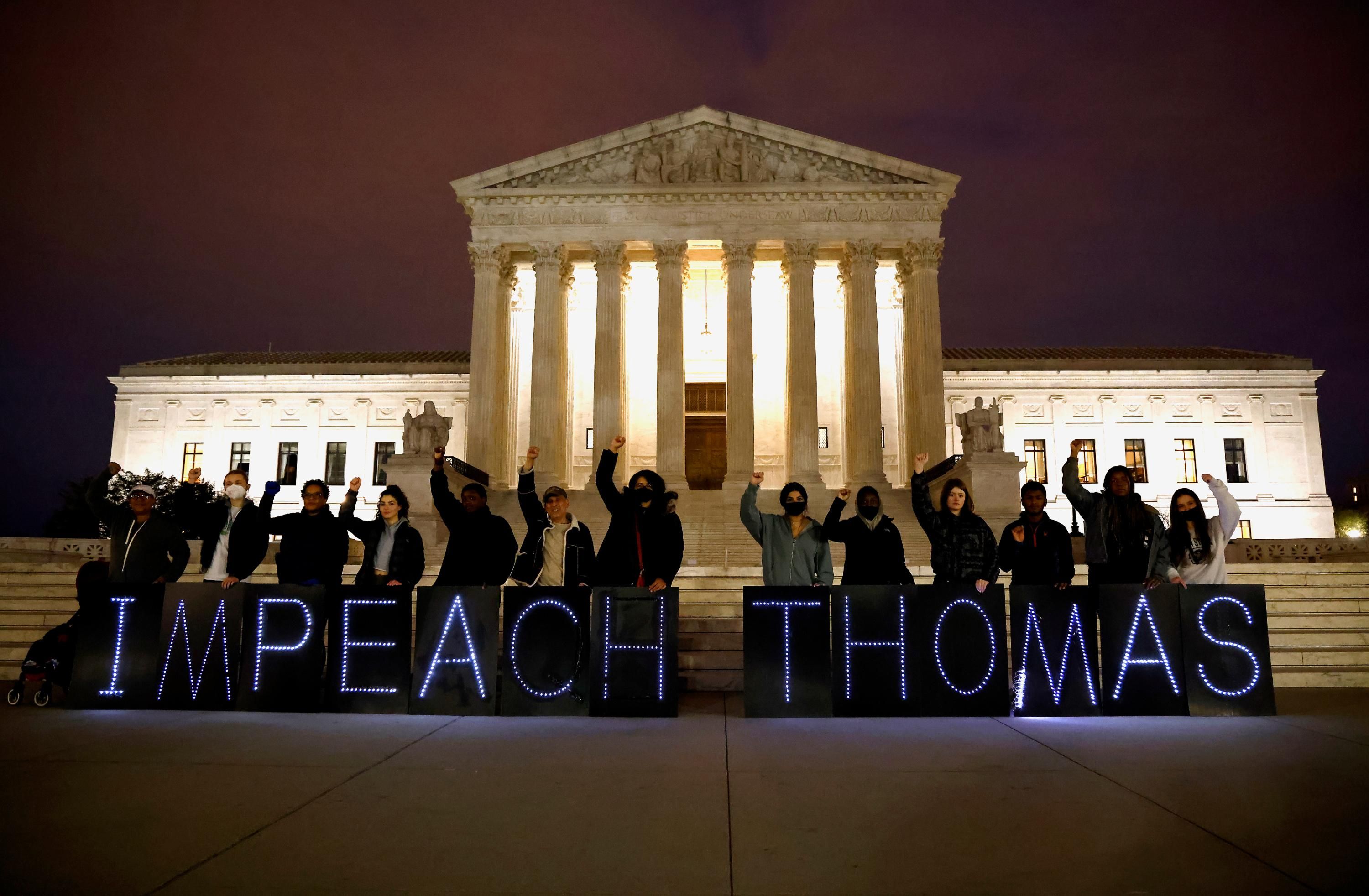 Demonstrators call for the impeachment of Justice Clarence Thomas