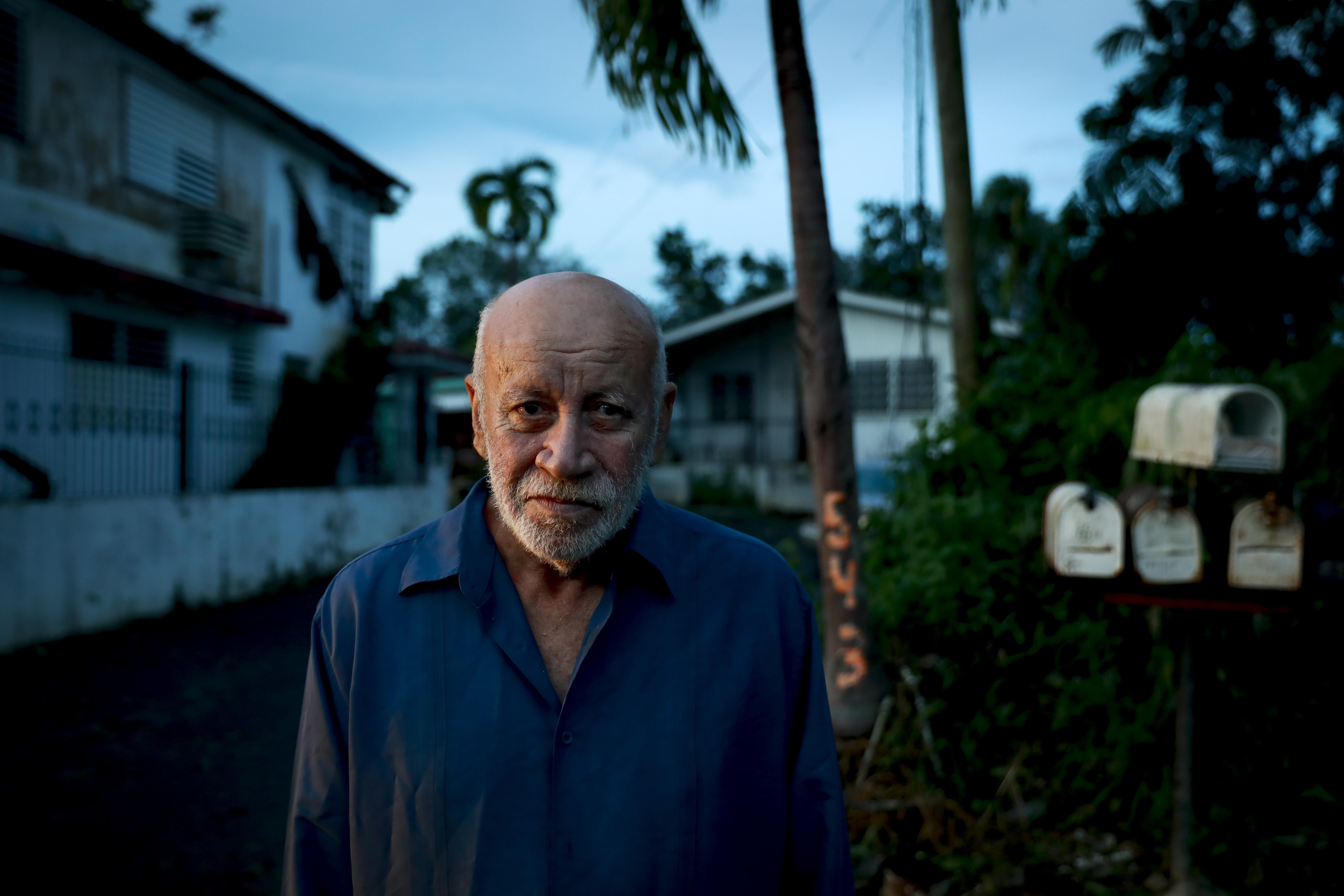 Wilson Aponte poses in front of his home on September 20, 2022 in Cabo Rojo, Puerto Rico.