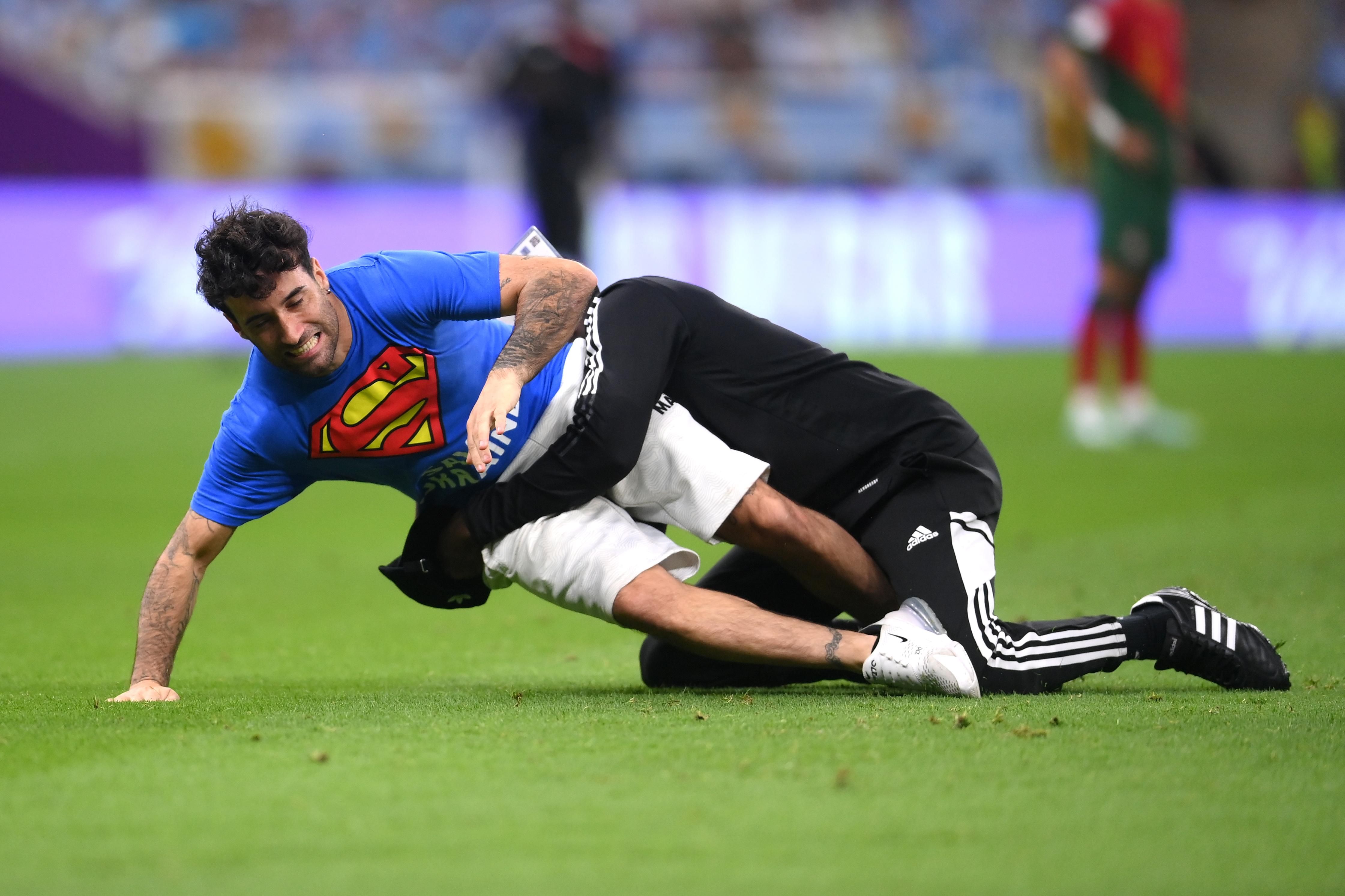 Protester tackled during the World Cup