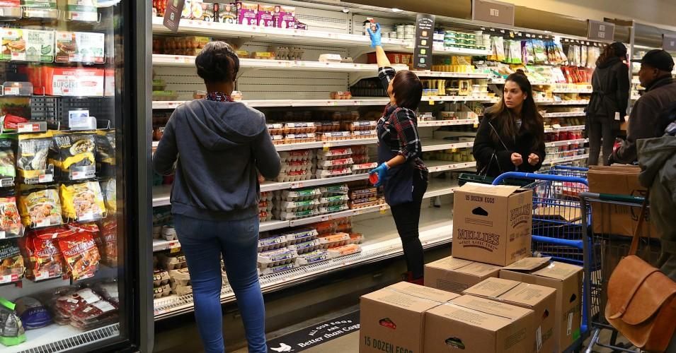 People shopping in the egg and dairy case on March 13, 2020 at Whole Foods Merket in Vauxhall, New Jersey. (Photo: Rich Graessle/Icon Sportswire via Getty Images)